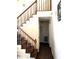Hallway and staircase showcasing a classic design and providing access to upper level and other rooms at 8330 Longridge Rd, North Charleston, SC 29418