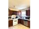 Kitchen with gas range, stainless steel dishwasher, and wood cabinets at 8330 Longridge Rd, North Charleston, SC 29418