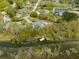 This aerial view showcases the home's location on the water, offering stunning views and convenient boat access at 847 Condon Dr, James Island, SC 29412