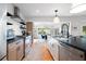 Stylish kitchen featuring stainless steel appliances and a connected dining area at 847 Condon Dr, James Island, SC 29412