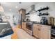 Well-equipped kitchen with stainless steel appliances, ample counter space, and stylish cabinets at 847 Condon Dr, James Island, SC 29412