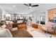 An open living space features hardwood floors, modern decor, and a seamless connection to the kitchen at 847 Condon Dr, James Island, SC 29412