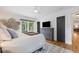 The main bedroom has an exterior view, closet, and a decorative ceiling fan at 847 Condon Dr, James Island, SC 29412