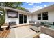 Cozy patio with stylish outdoor furniture, perfect for relaxation and entertaining friends and Gathering outdoors at 847 Condon Dr, James Island, SC 29412