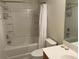 Clean bathroom with a tub, shower, and white vanity at 8634 Grassy Oak Trl, North Charleston, SC 29420
