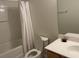 Cozy bathroom featuring a shower with curtain and white sink at 8634 Grassy Oak Trl, North Charleston, SC 29420
