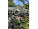 Charming clubhouse entrance with well-manicured landscaping, located in a peaceful community at 8634 Grassy Oak Trl, North Charleston, SC 29420