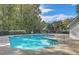 Community pool with inviting blue water on a sunny day at 8634 Grassy Oak Trl, North Charleston, SC 29420