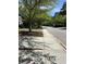 Quiet residential street lined with mature trees and sidewalks, offering a peaceful neighborhood setting at 8634 Grassy Oak Trl, North Charleston, SC 29420