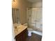 Bathroom featuring a glass-enclosed shower, tile flooring, and a vanity with a white sink at 9032 Maple Grove Dr, Summerville, SC 29485