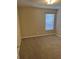 Cozy bedroom with neutral carpeting and a window for natural light at 9032 Maple Grove Dr, Summerville, SC 29485