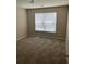 Bedroom with neutral carpeting and natural light from the window at 9032 Maple Grove Dr, Summerville, SC 29485