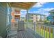 Outdoor deck with a grill and railing, perfect for grilling and enjoying the outdoors at 9042 Parlor Dr, Ladson, SC 29456
