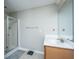 Bathroom featuring a shower stall with glass door and a single sink vanity with neutral color walls at 9042 Parlor Dr, Ladson, SC 29456