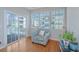Relaxing sitting area with hardwood floors and plenty of light from the sliding glass door at 9042 Parlor Dr, Ladson, SC 29456