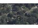 Aerial view of the property surrounded by lush greenery and mature trees at 1012 Cliffwood Dr, Mount Pleasant, SC 29464