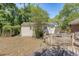 The backyard has a shed and a wooden deck, perfect for outdoor activities and relaxation at 1012 Cliffwood Dr, Mount Pleasant, SC 29464