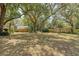 Large, shady backyard with mature trees and plenty of space for recreation and relaxation at 1012 Cliffwood Dr, Mount Pleasant, SC 29464