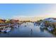 Picturesque waterfront view with boats and businesses lining the waterway, creating a vibrant atmosphere at 1012 Cliffwood Dr, Mount Pleasant, SC 29464