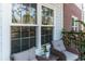Charming balcony with comfortable seating and a serene view of the surrounding greenery at 1025 Riverland Woods Pl # 906, Charleston, SC 29412