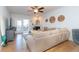 Comfortable living room with fireplace, access to a balcony and modern furnishings at 1025 Riverland Woods Pl # 906, Charleston, SC 29412