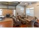 Clubhouse lounge area featuring comfortable seating and a cozy fireplace at 1025 Riverland Woods Pl # 906, Charleston, SC 29412