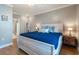 This large main bedroom is spacious and features a king bed, large window, and en-suite bath at 1025 Riverland Woods Pl # 906, Charleston, SC 29412