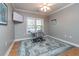Office space featuring hardwood floors and a desk by the window at 1025 Riverland Woods Pl # 906, Charleston, SC 29412