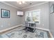 Office space featuring hardwood floors and a desk by the window at 1025 Riverland Woods Pl # 906, Charleston, SC 29412