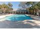 Inviting swimming pool with a pool house, creating a relaxing and social atmosphere at 1025 Riverland Woods Pl # 906, Charleston, SC 29412