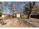 Backyard with a shed, trees, and a wooden fence enclosing the property at 119 Carolina Wren Ave, Ladson, SC 29456