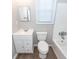 This bathroom features a white vanity and tub and shower combination at 119 Carolina Wren Ave, Ladson, SC 29456