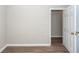 This bedroom features updated vinyl flooring, a closet, and neutral paint at 119 Carolina Wren Ave, Ladson, SC 29456