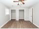 This bedroom features new vinyl flooring, neutral paint, and closets at 119 Carolina Wren Ave, Ladson, SC 29456