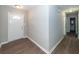 Angle view of the foyer with wood floors at 119 Carolina Wren Ave, Ladson, SC 29456
