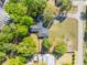 Areal view of the property's roofline, surrounding trees, and proximity to nearby street at 1128 Melvin Bennett Rd, Mount Pleasant, SC 29464