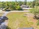 Areal view of the property's proximity to a nearby commercial property, trees, and nearby street at 1128 Melvin Bennett Rd, Mount Pleasant, SC 29464