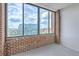 Enclosed balcony with brick walls and city views at 14 Lockwood Dr # 11H, Charleston, SC 29401
