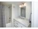 Bathroom with marble countertop, shower and tub combination at 14 Lockwood Dr # 2D, Charleston, SC 29401