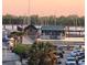 Picturesque water view overlooking palm trees, boat docks, building and boats in the harbor at 14 Lockwood Dr # 2D, Charleston, SC 29401