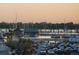 Scenic water view overlooking palm trees, boat docks, building and many boats in the harbor at 14 Lockwood Dr # 2D, Charleston, SC 29401