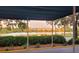 Beautiful view overlooking manicured hedges and a serene lake reflecting homes in the distance at 14 Lockwood Dr # 2D, Charleston, SC 29401
