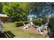 Beautiful backyard with outdoor seating and lush landscaping perfect for entertaining at 1516 Village Sq, Mount Pleasant, SC 29464