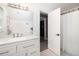 This updated bathroom features a granite countertop and a shower with curtain at 1516 Village Sq, Mount Pleasant, SC 29464