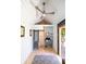 This bathroom features a sliding barn door, steel sink, and white shiplap, creating a rustic yet modern aesthetic at 1516 Village Sq, Mount Pleasant, SC 29464