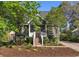 Charming single-story home with meticulously landscaped front yard and inviting entrance at 1516 Village Sq, Mount Pleasant, SC 29464