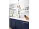 Close up of the beautiful modern sink and marble countertop with stylish shelves and decor at 1516 Village Sq, Mount Pleasant, SC 29464