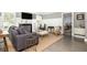 Cozy living room with a marble fireplace, wainscotting and stylish decor at 1516 Village Sq, Mount Pleasant, SC 29464