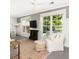 Cozy living room with large windows overlooking a scenic view of water at 1516 Village Sq, Mount Pleasant, SC 29464