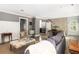 Open-concept living area with hardwood floors and a view into dining space at 1516 Village Sq, Mount Pleasant, SC 29464